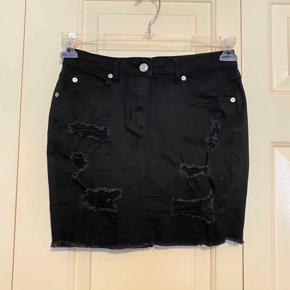 Black distressed denim skirt
